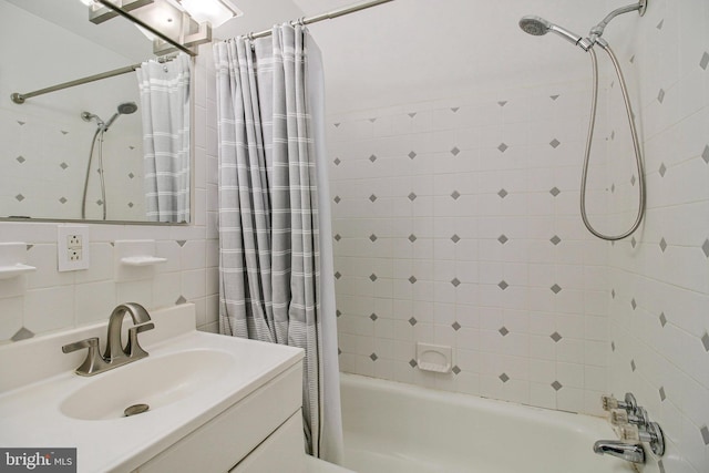 7212 Donnell Pl Unit D5, District Heights, MD 20747 - bathroom with shower / tub combo, tile walls, and vanity