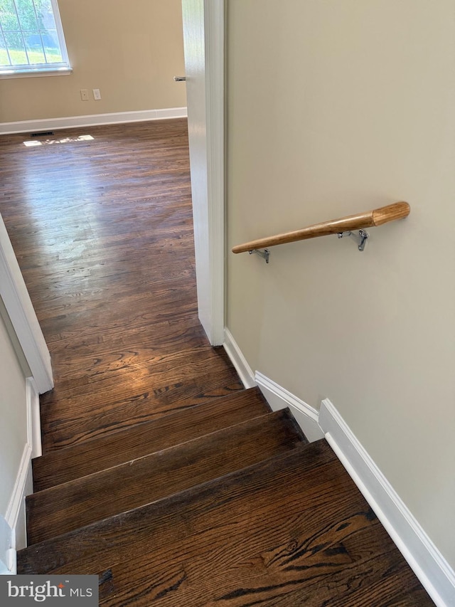 18820 Kerill Rd, Triangle, VA 22172 - staircase with wood finished floors and baseboards