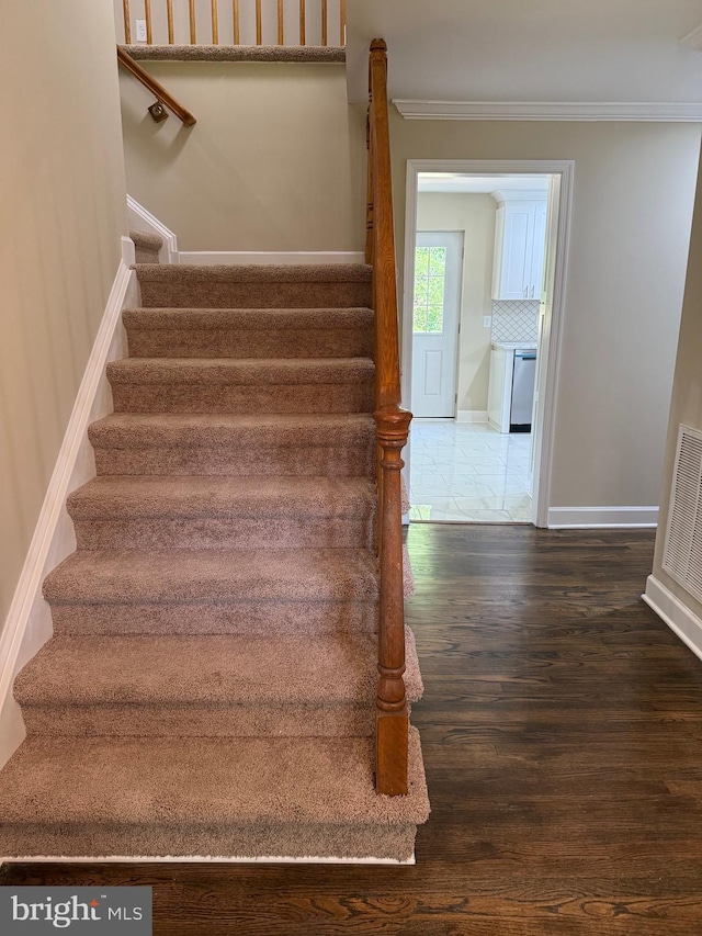 18820 Kerill Rd, Triangle, VA 22172 - stairway with wood finished floors and crown molding
