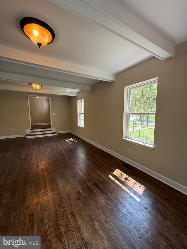 18820 Kerill Rd, Triangle, VA 22172 - spare room with beam ceiling and dark wood-style flooring