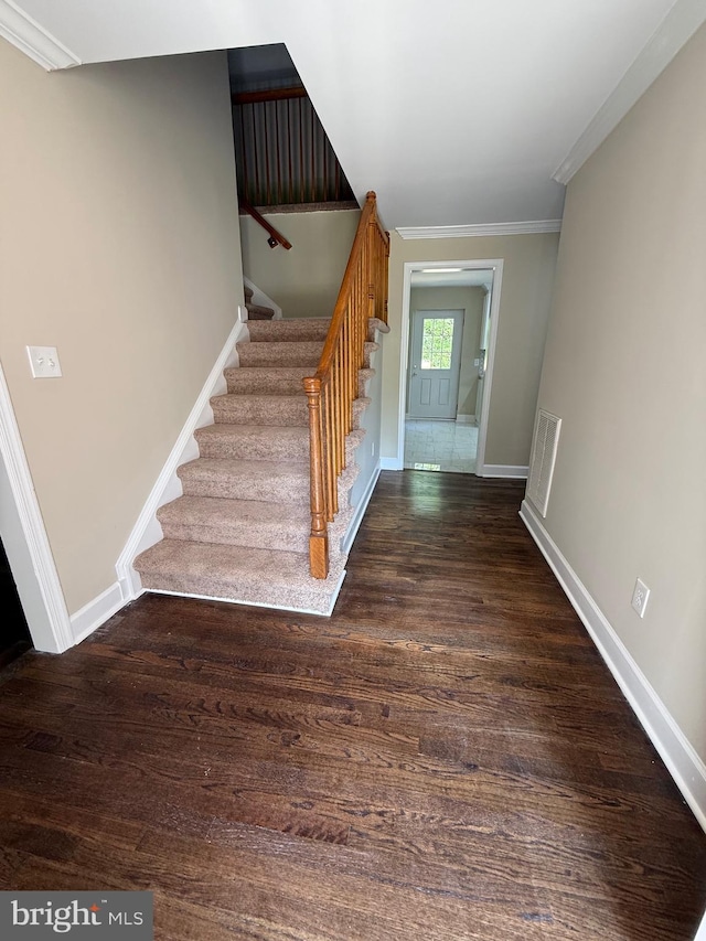 18820 Kerill Rd, Triangle, VA 22172 - stairway featuring ornamental molding and wood finished floors