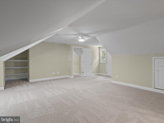 18820 Kerill Rd, Triangle, VA 22172 - additional living space with light carpet, lofted ceiling, and a ceiling fan