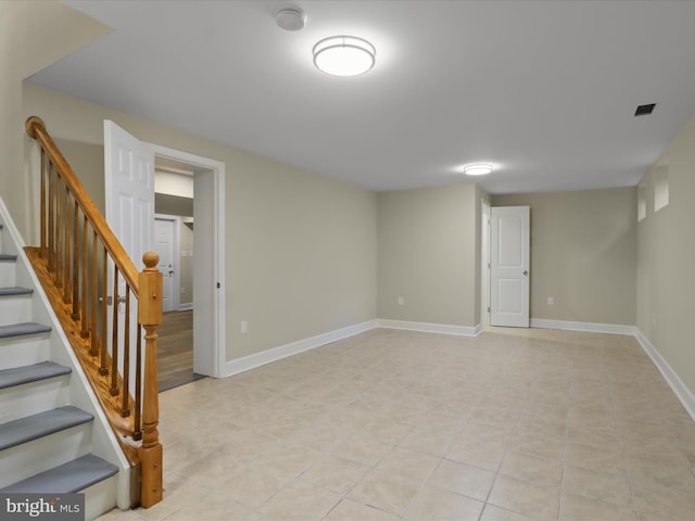 18820 Kerill Rd, Triangle, VA 22172 - below grade area with light tile patterned flooring and stairs