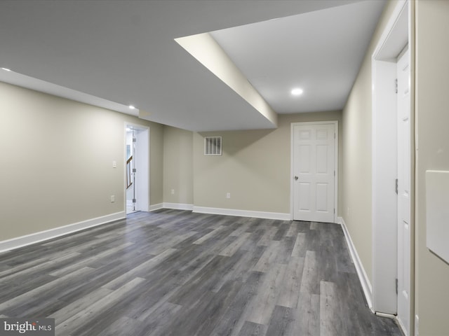 18820 Kerill Rd, Triangle, VA 22172 - finished below grade area with dark wood-type flooring and recessed lighting