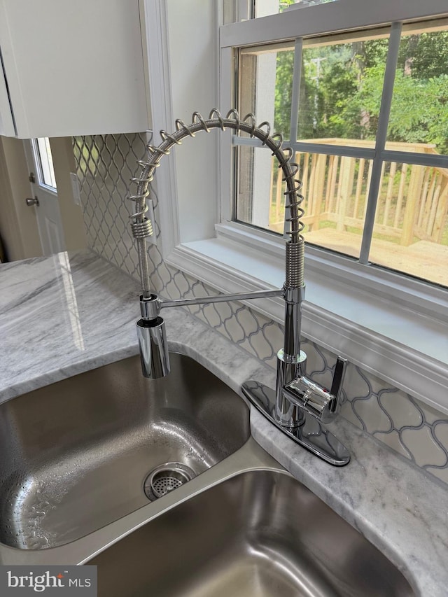 18820 Kerill Rd, Triangle, VA 22172 - kitchen view of a sink and light stone countertops