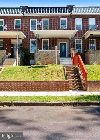 multi unit property with brick siding