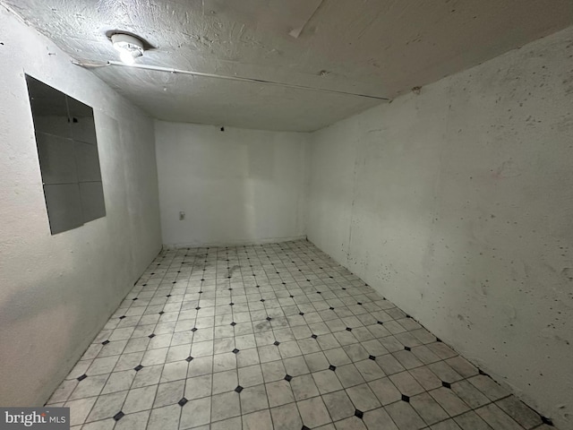 unfurnished room with light floors