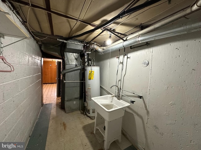 unfinished basement with heating unit and gas water heater