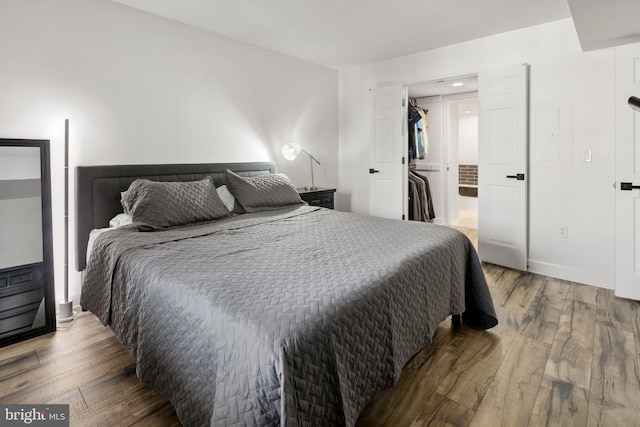 1276 N Wayne St Unit 408, Arlington, VA 22201 - bedroom featuring hardwood / wood-style floors