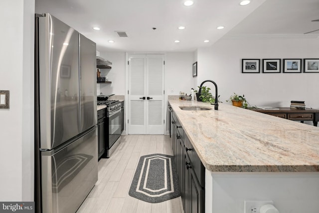 1276 N Wayne St Unit 408, Arlington, VA 22201 - kitchen with a sink, appliances with stainless steel finishes, visible vents, recessed lighting, and a peninsula
