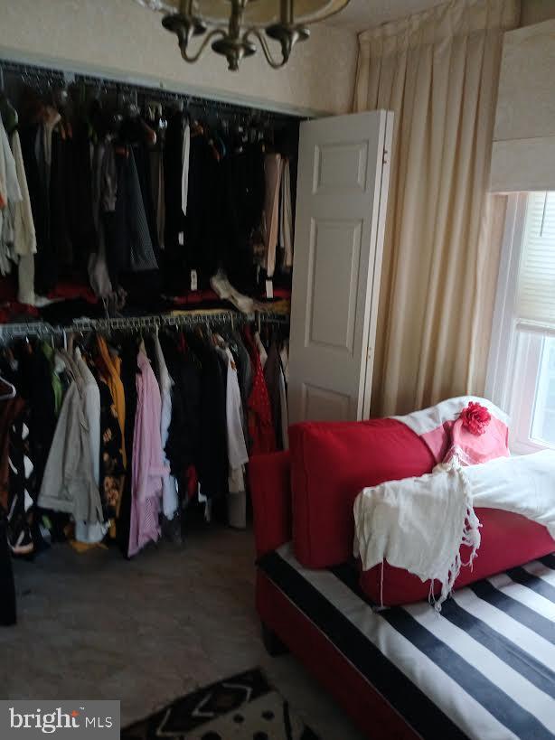 2145 Old Welsh Rd, Willow Grove, PA 19090 - bedroom with a chandelier and a closet