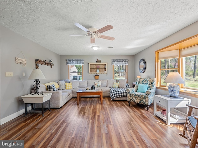 2796 Green Spring Rd, Winchester, VA 22603 - living area with a ceiling fan, baseboards, wood finished floors, and a textured ceiling