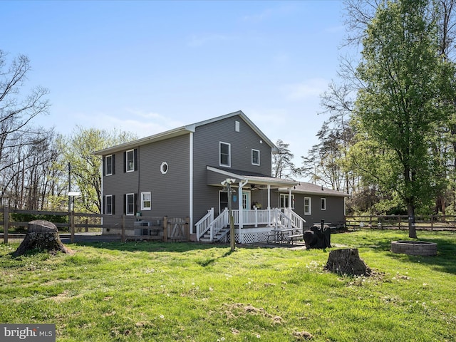 2796 Green Spring Rd, Winchester, VA 22603 - back of house with covered porch, stairway, fence, ceiling fan, and a lawn