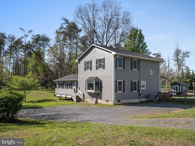 2796 Green Spring Rd, Winchester, VA 22603 - view of front of house with a front lawn, cooling unit, a sunroom, and crawl space