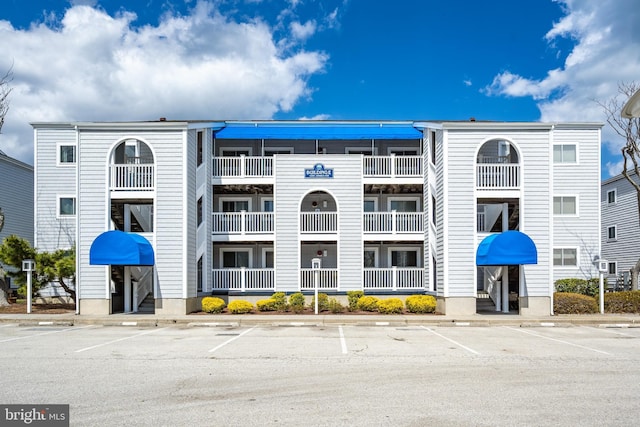 12301 Jamaica Ave Unit E21605, Ocean City, MD 21842 - view of building exterior featuring uncovered parking