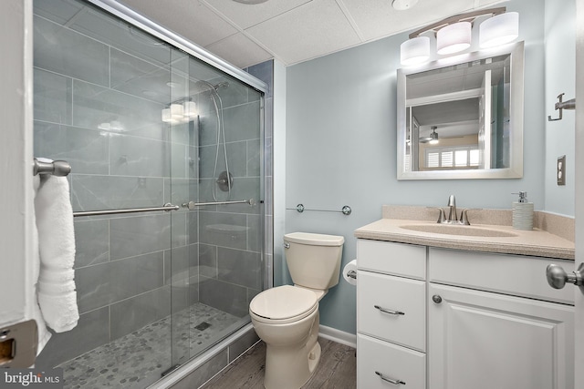 12301 Jamaica Ave Unit E21605, Ocean City, MD 21842 - full bathroom with toilet, vanity, a stall shower, and wood finished floors