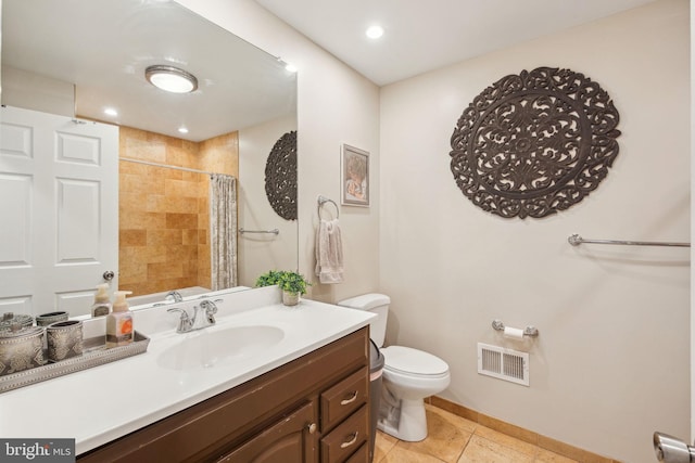 full bath with a shower with curtain, vanity, toilet, baseboards, and visible vents