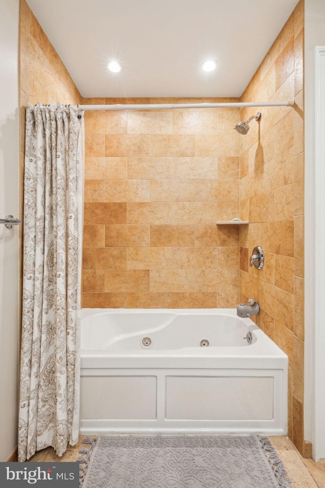 bathroom featuring a combined bath / shower with jetted tub and recessed lighting