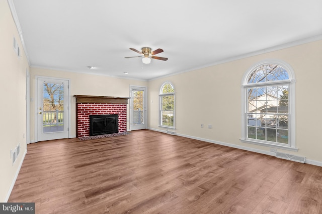 878 Buttermilk Ct, Harrisburg, PA 17111 - unfurnished living room featuring visible vents, a ceiling fan, ornamental molding, and wood finished floors