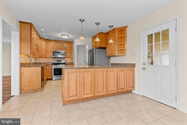 878 Buttermilk Ct, Harrisburg, PA 17111 - kitchen featuring dark stone countertops, open shelves, a sink, a peninsula, and stainless steel appliances