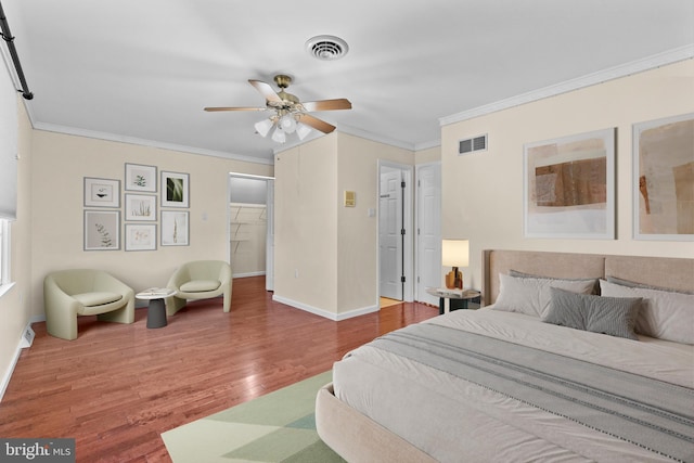878 Buttermilk Ct, Harrisburg, PA 17111 - bedroom featuring visible vents, baseboards, ornamental molding, and wood finished floors