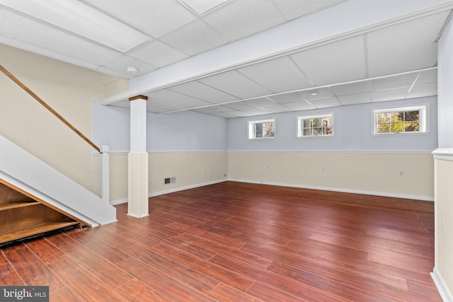 878 Buttermilk Ct, Harrisburg, PA 17111 - basement featuring stairs, visible vents, a paneled ceiling, and wood finished floors