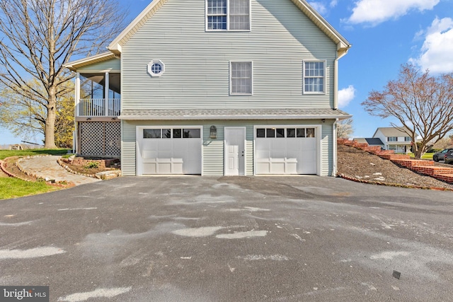 878 Buttermilk Ct, Harrisburg, PA 17111 - view of property exterior with an attached garage and aphalt driveway