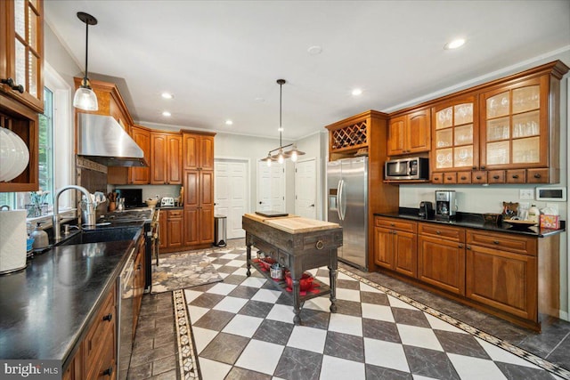 972 Smithbridge Rd, Glen Mills, PA 19342 - kitchen with dark countertops, appliances with stainless steel finishes, range hood, and brown cabinets