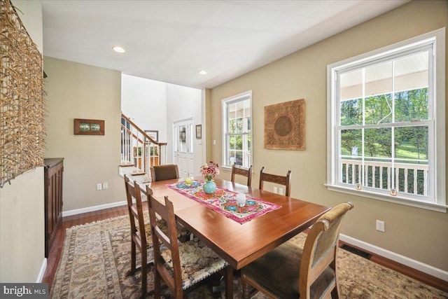 972 Smithbridge Rd, Glen Mills, PA 19342 - dining space with stairs, baseboards, visible vents, and wood finished floors