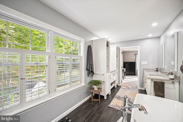 972 Smithbridge Rd, Glen Mills, PA 19342 - full bath with vanity, a freestanding tub, wood finished floors, baseboards, and recessed lighting