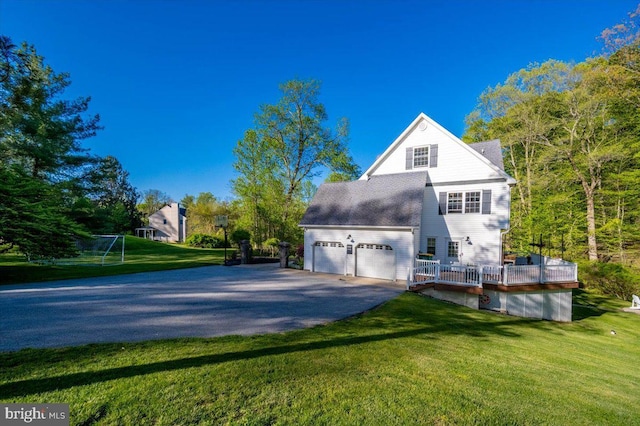 972 Smithbridge Rd, Glen Mills, PA 19342 - view of property exterior with a lawn, a garage, and aphalt driveway