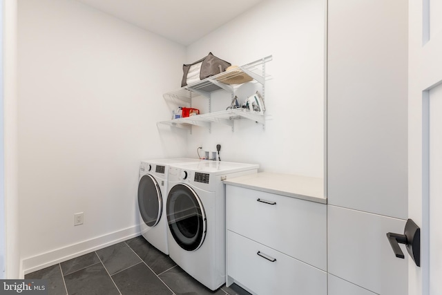 330 Trout Rd, State College, PA 16801 - laundry area featuring baseboards, cabinet space, independent washer and dryer, and dark tile patterned floors