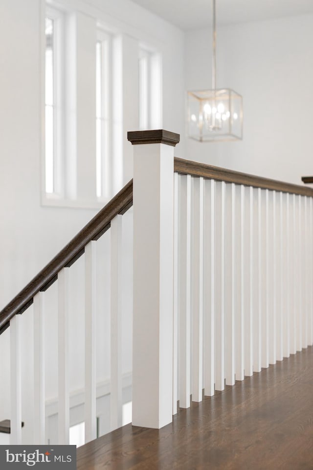 330 Trout Rd, State College, PA 16801 - stairs featuring wood finished floors and a notable chandelier