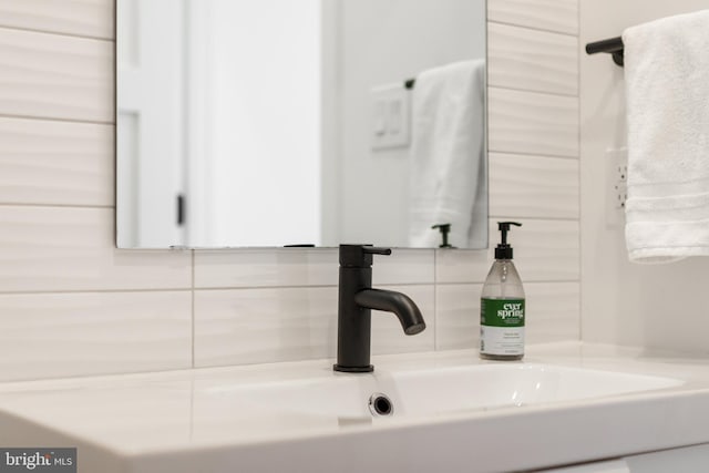 330 Trout Rd, State College, PA 16801 - interior details featuring decorative backsplash and a sink