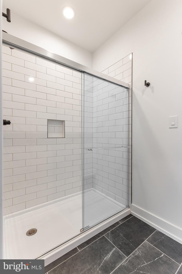 330 Trout Rd, State College, PA 16801 - bathroom featuring baseboards, marble finish floor, and a shower stall