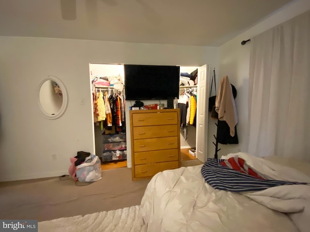 1294 Cooper St Unit B5, Edgewater Park, NJ 08010 - carpeted bedroom featuring a closet, baseboards, and a walk in closet