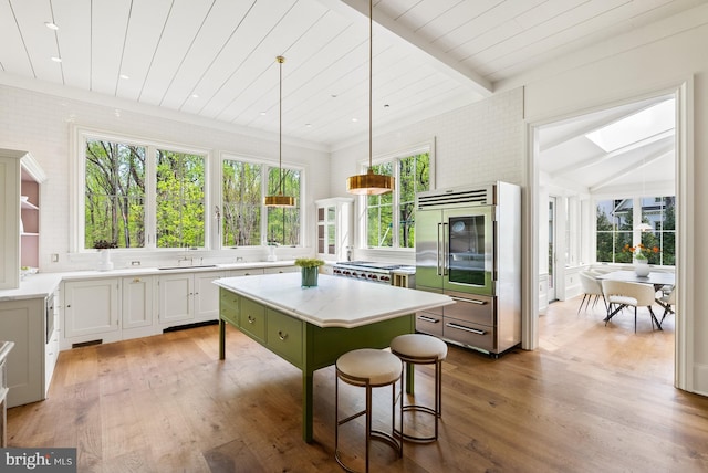 827 Turkey Run Rd, Mclean, VA 22101 - kitchen with stainless steel built in fridge, a kitchen island, plenty of natural light, a sink, and wooden ceiling
