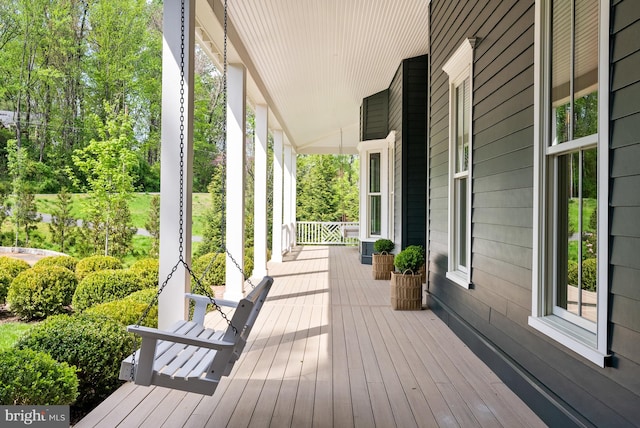 827 Turkey Run Rd, Mclean, VA 22101 - wooden terrace featuring covered porch