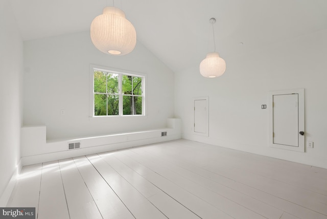 827 Turkey Run Rd, Mclean, VA 22101 - unfurnished living room featuring vaulted ceiling and wood finished floors