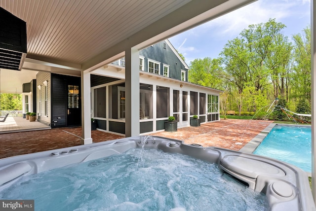 827 Turkey Run Rd, Mclean, VA 22101 - outdoor pool featuring a sunroom, a hot tub, and a patio area