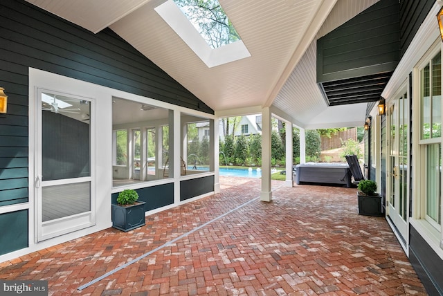 827 Turkey Run Rd, Mclean, VA 22101 - view of patio featuring a hot tub, a sunroom, and an outdoor pool