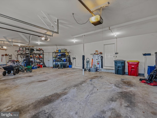 garage featuring a garage door opener