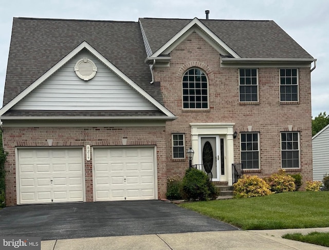 8219 Selwin Ct, Baltimore, MD 21237 - view of front of house with driveway, roof with shingles, brick siding, and a front yard