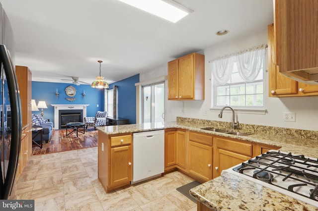 8219 Selwin Ct, Baltimore, MD 21237 - kitchen featuring white appliances, a sink, a peninsula, open floor plan, and ceiling fan