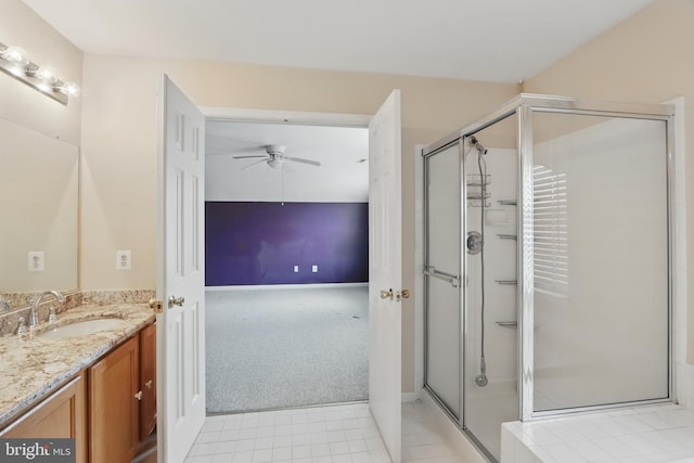 8219 Selwin Ct, Baltimore, MD 21237 - full bath featuring a shower stall, a ceiling fan, vanity, tile patterned flooring, and baseboards
