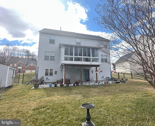 8219 Selwin Ct, Baltimore, MD 21237 - rear view of property featuring a sunroom and a patio