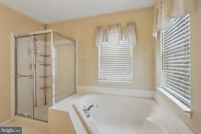 8219 Selwin Ct, Baltimore, MD 21237 - full bath featuring a shower stall, healthy amount of natural light, and a bath