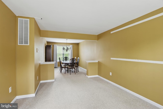 8219 Selwin Ct, Baltimore, MD 21237 - dining area featuring a chandelier, baseboards, and carpet flooring