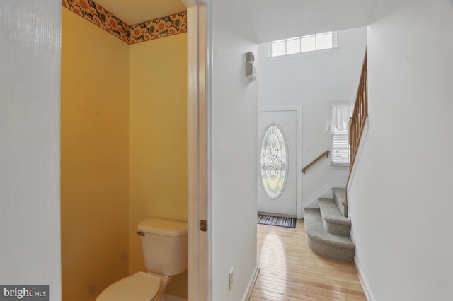 8219 Selwin Ct, Baltimore, MD 21237 - bathroom with toilet, hardwood / wood-style flooring, and baseboards