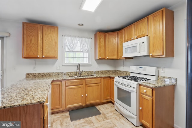 8219 Selwin Ct, Baltimore, MD 21237 - kitchen featuring white appliances, a sink, and light stone countertops